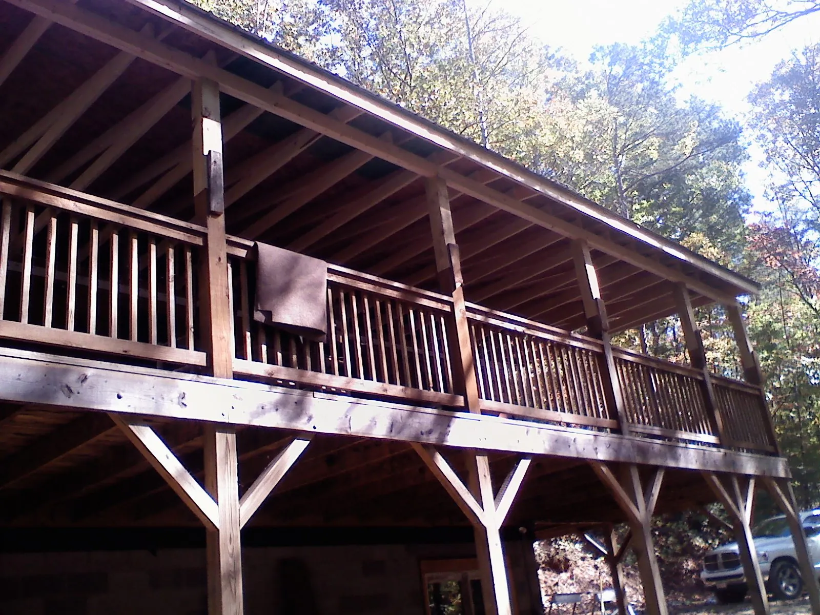 Timber framing under a new elevated porch and deck — Roof Leak Repair in Camanche by Roofing Brothers